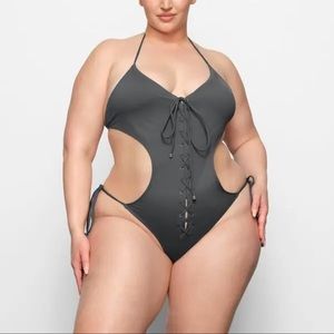 Skims Signature swim lace up Monokini in the color Gunmetal size 4X